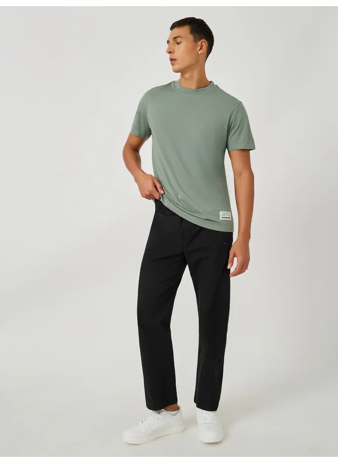 ستايلي Styli Badge Detail Mock Neck Regular Fit T-Shirt