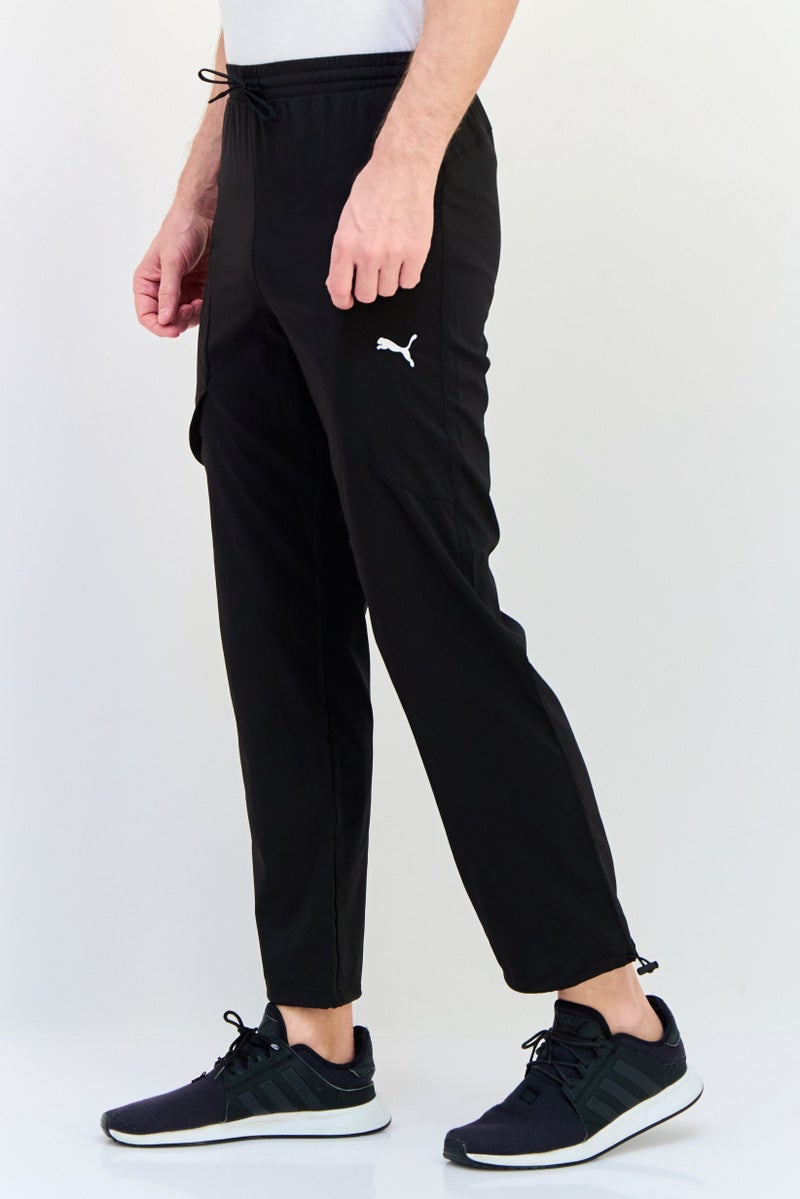 PUMA سروال رياضي للرجال بتصميم لائق بشعار العلامة التجارية، أسود - Image 2