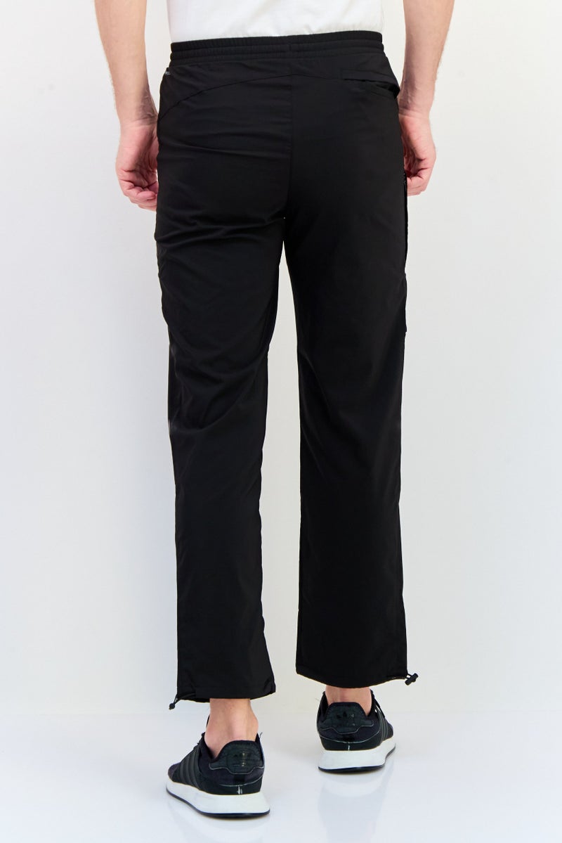 PUMA سروال رياضي للرجال بتصميم لائق بشعار العلامة التجارية، أسود - Image 3