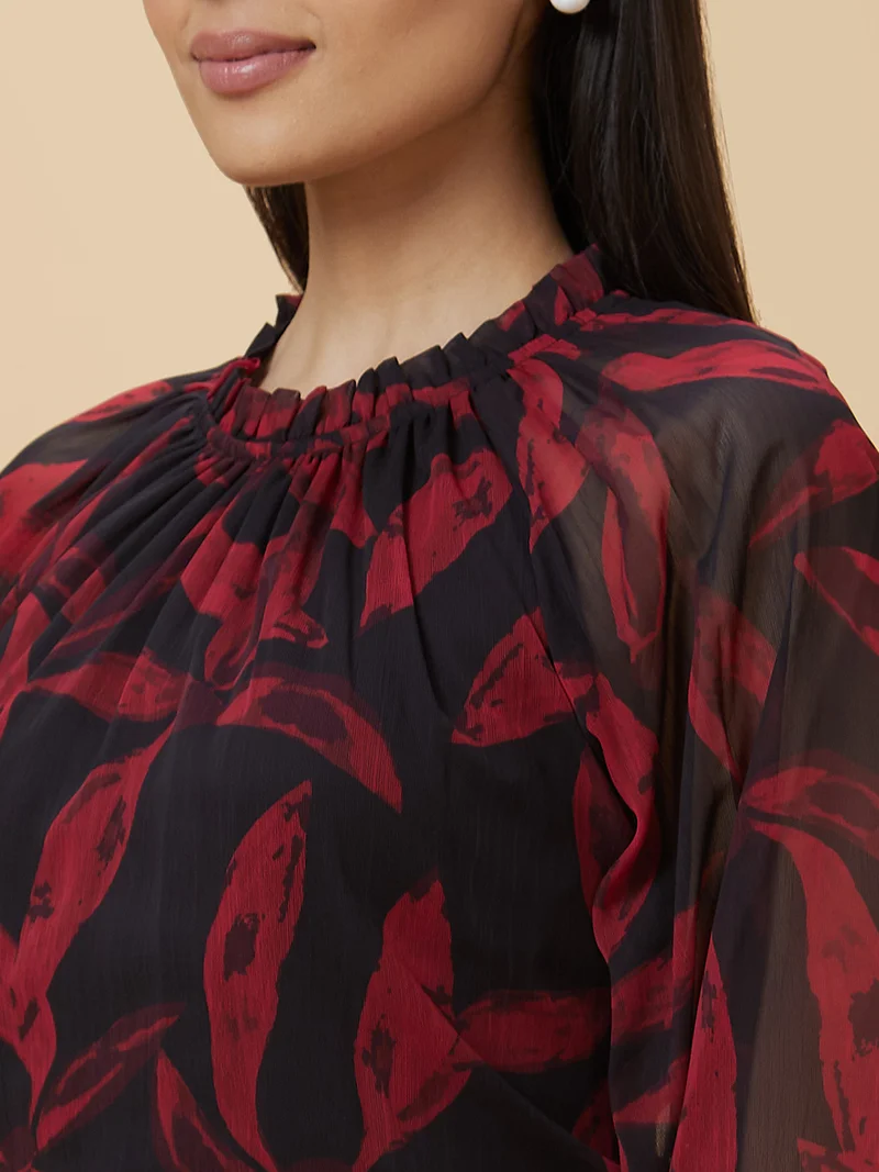 جلو باص Women Black Floral Print Puff Sleeve Tie-Up Neck Top