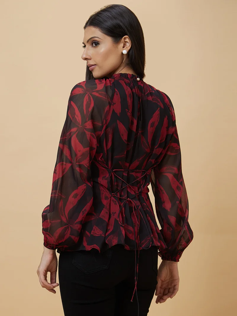 جلو باص Women Black Floral Print Puff Sleeve Tie-Up Neck Top