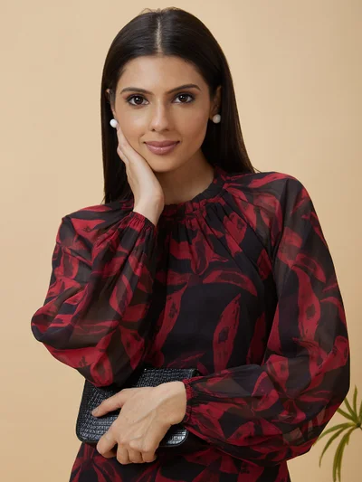 جلو باص Women Black Floral Print Puff Sleeve Tie-Up Neck Top