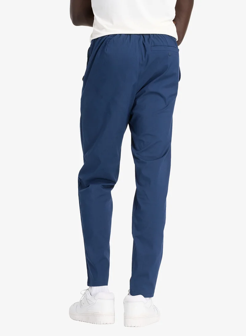 New Balance 30" Athletics Standard Tapered Pants