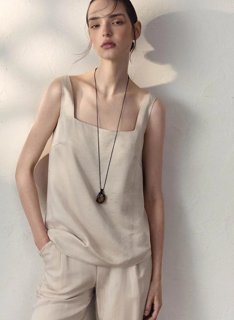 Viscose top with asymmetrical hem