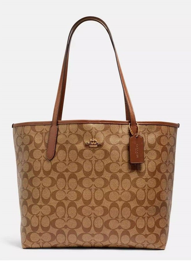 coachoutlet COACH City Tote Bag In Signature Canvas - Image 1