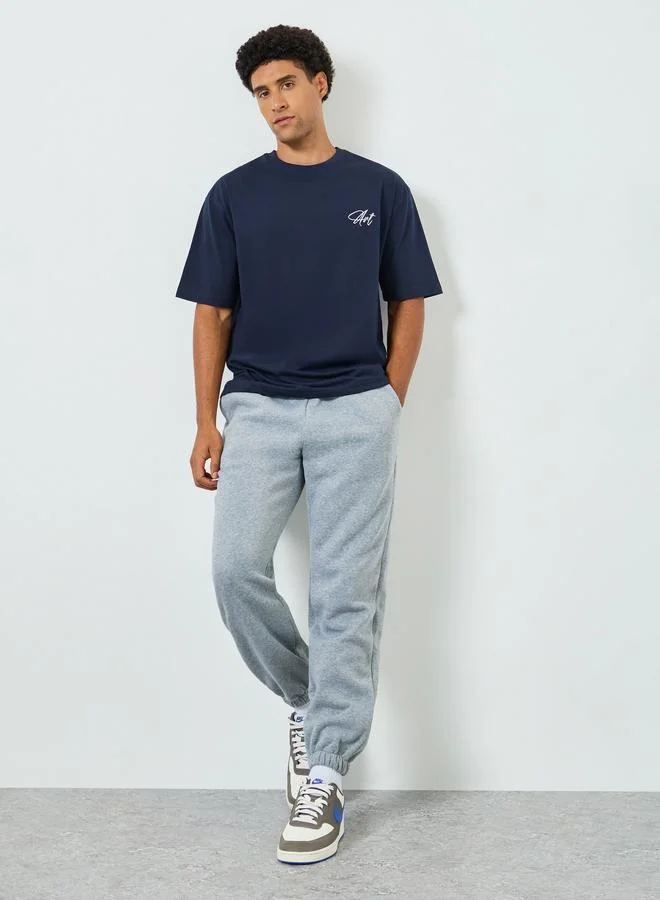 Styli Men Navy Blue Oversized Embroidered T-Shirt