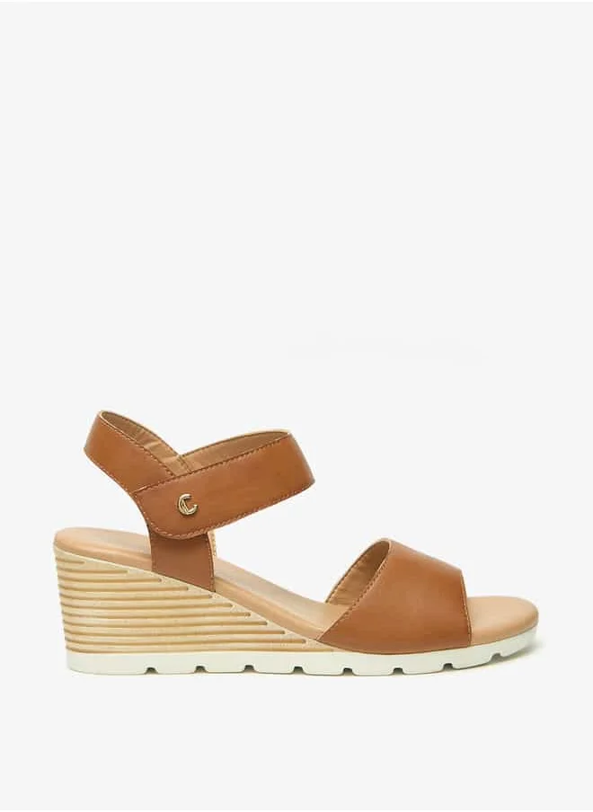 Le Confort Women Solid Wedge Heel Sandals with Hook and Loop Closure