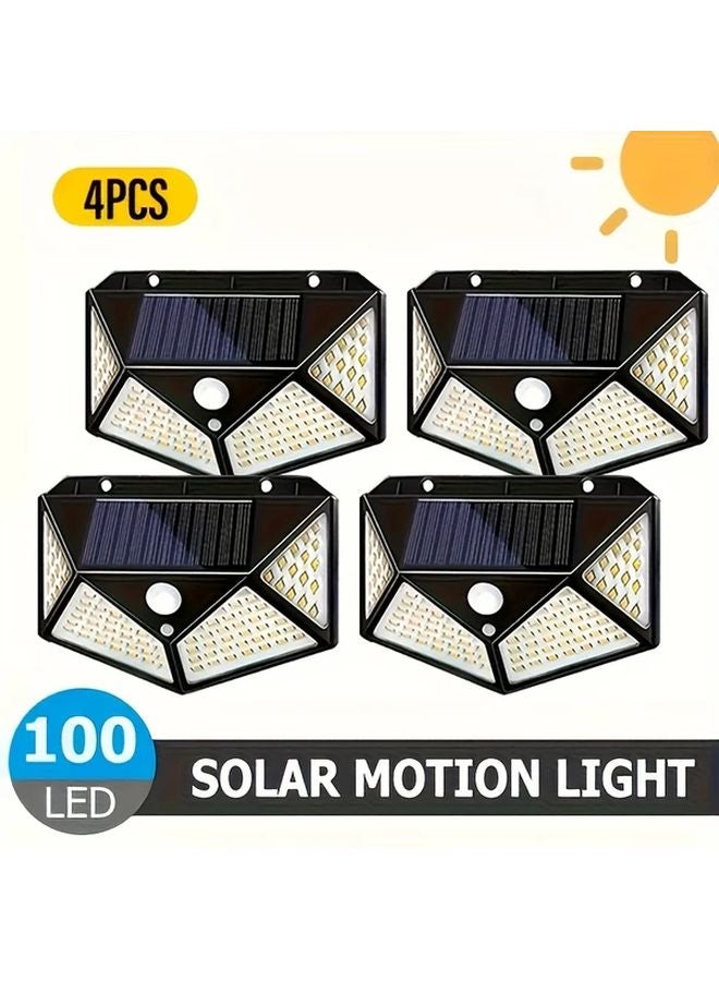 أضواء شمسية خارجية 4 قطع 100 لمبة LED 3 أوضاع استشعار حركة لاسلكية للحديقة والسياج - Image 1