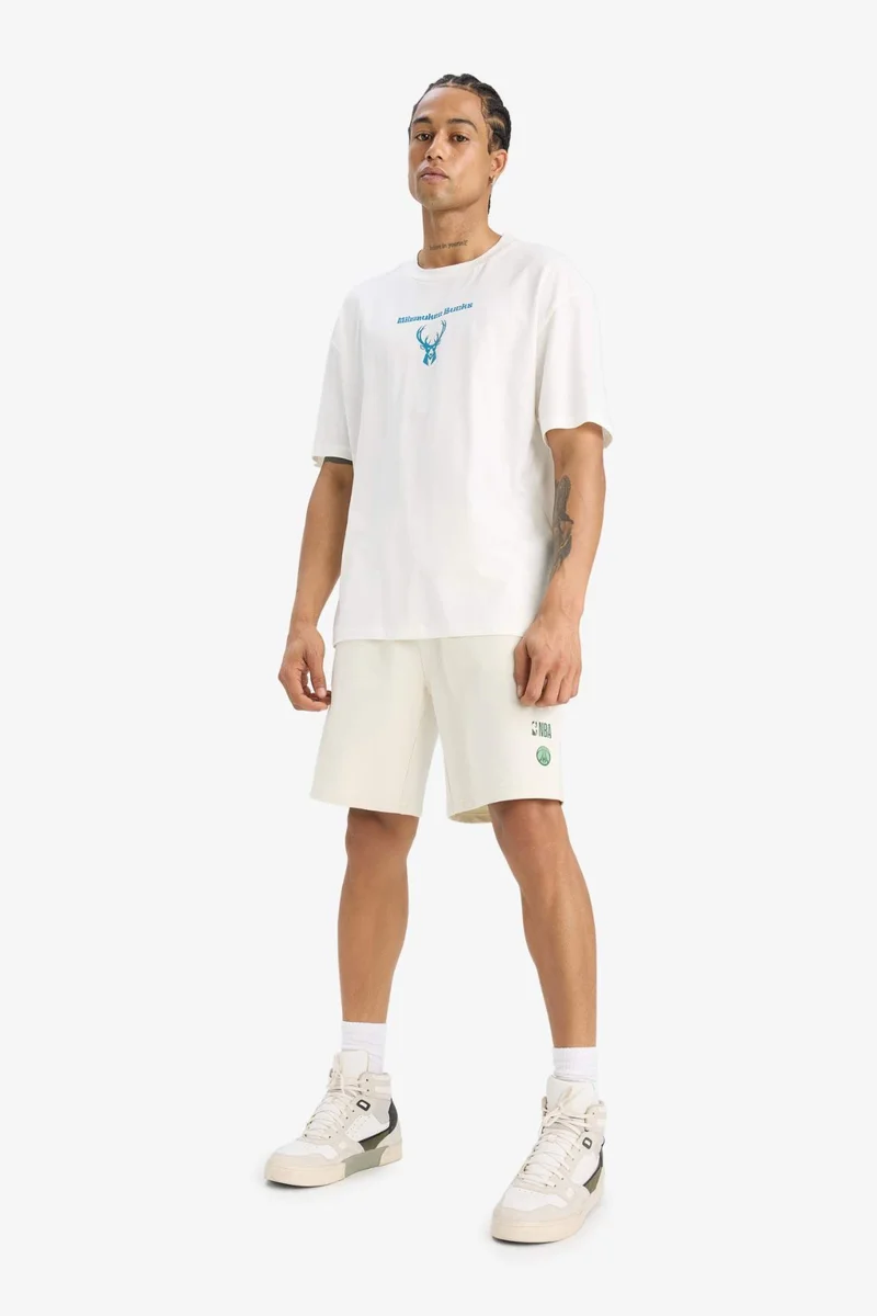 ديفاكتو Oversize Wide Fit Crew Neck Back Printed Short Sleeve T-Shirt