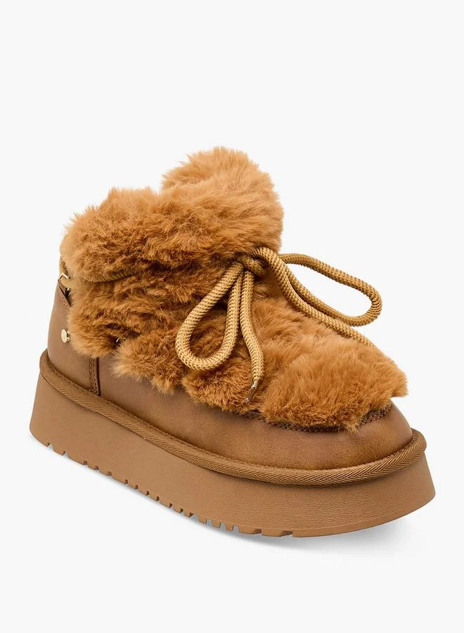 فلورا بيلا من شو إكسبرس بوت نسائي بكعب من الفرو الصناعي