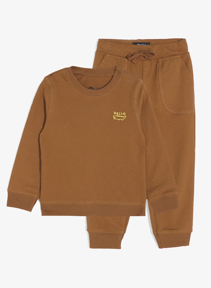 ريبلز مع نمشي طقم ولادي من قطعتين: سويت شيرت وبنطلون رياضي