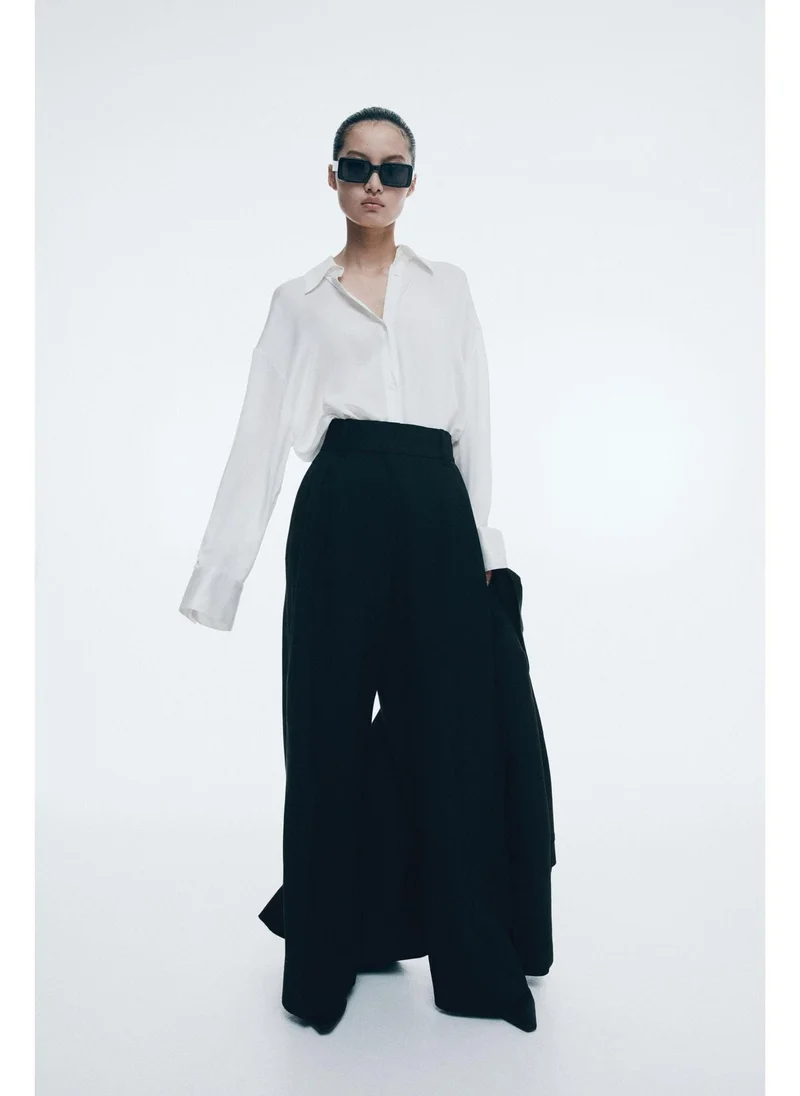 اتش اند ام Wide linen-blend trousers