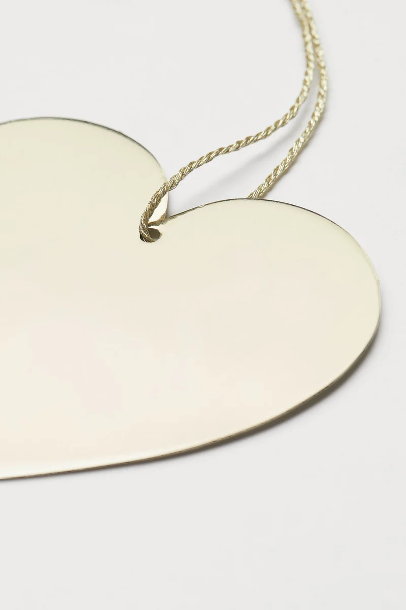 اتش اند ام زينة لموسم الأعياد من المعدن