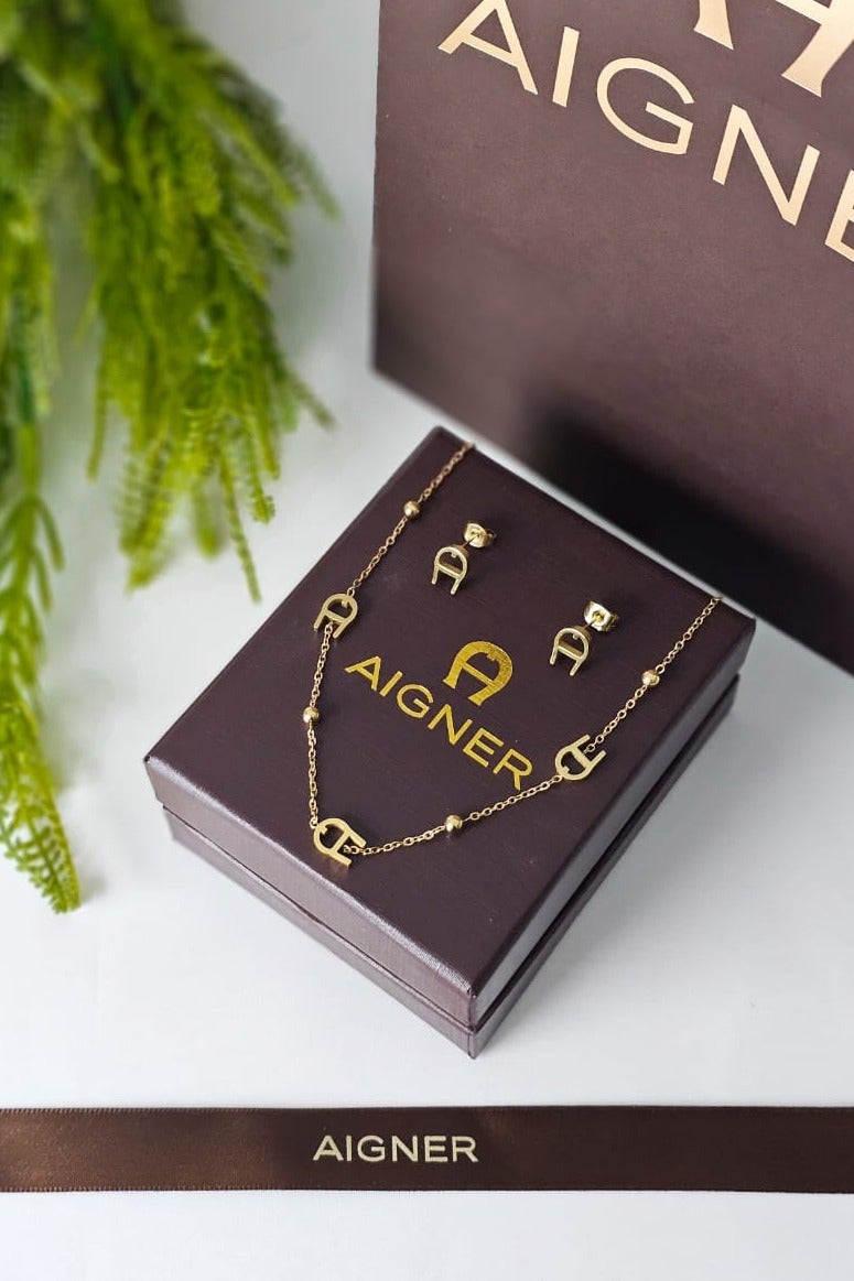 Aigner necklace and earring set with accessories