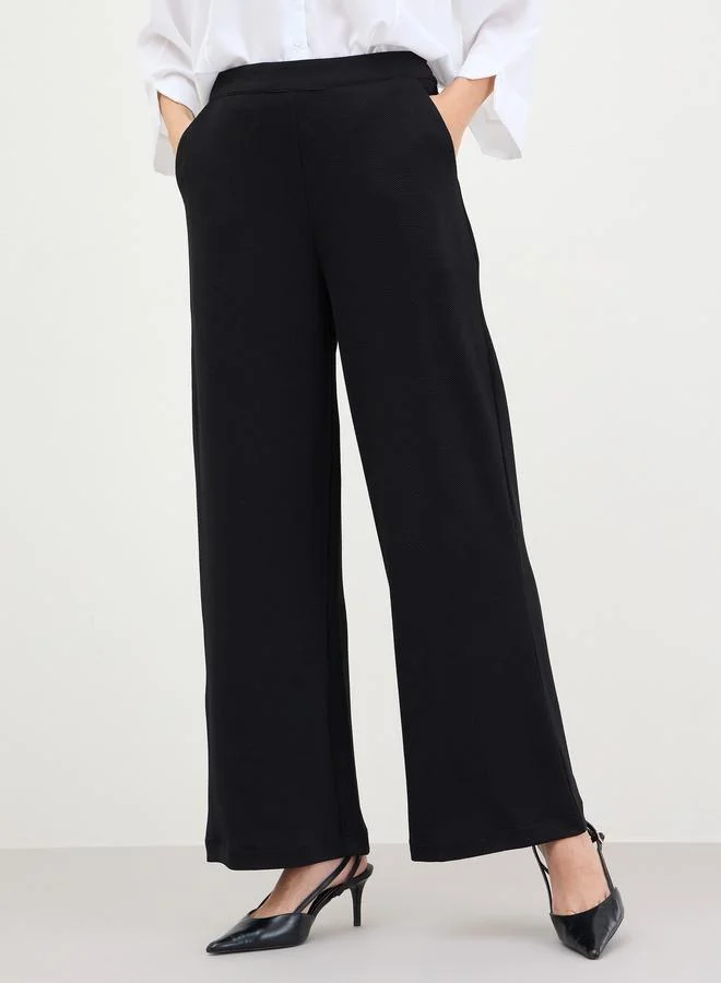 ستايلي بنطال بأرجل واسعة