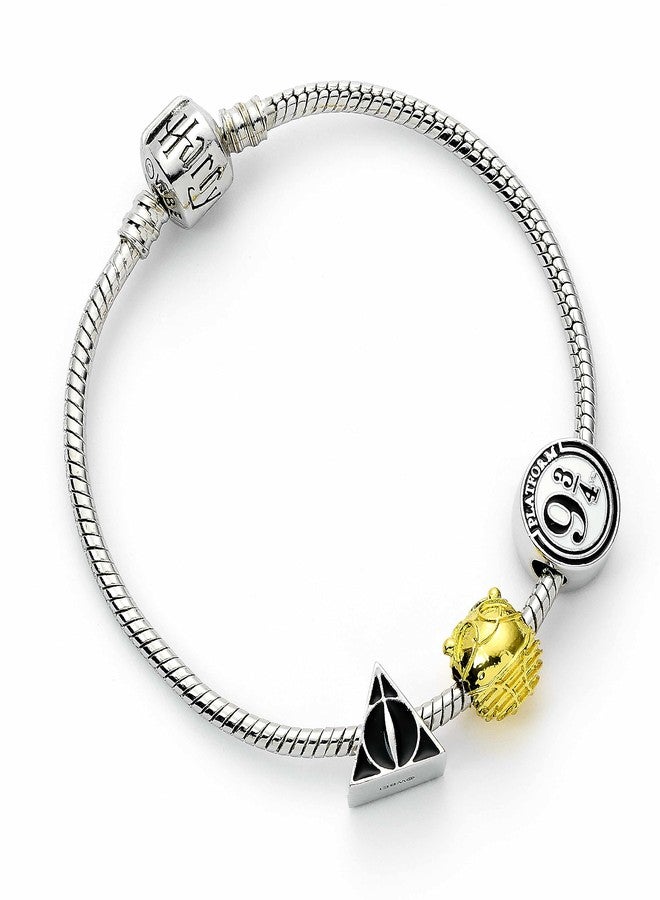 Harry Potter Official Silver Plated Bracelet with Deathly Hallows, Golden Snitch and Platform 9 3/4 Charm - Image 1