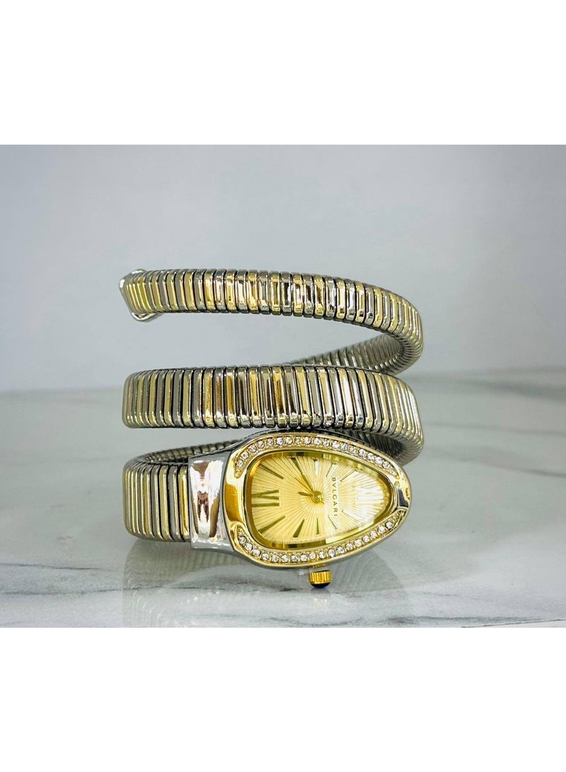 بولغاري ساعة يد حريمي فاخرة أنالوج – سوار حلزوني ذهبي وفضي بإطار مرصع بالفصوص