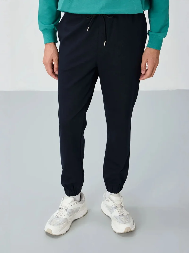 تومي لايف TOMMY Men's Regular Fit Fleece Sweatpants
