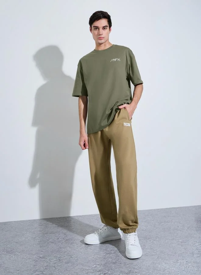 Styli Olive Graphic Print Crew Neck T-Shirt