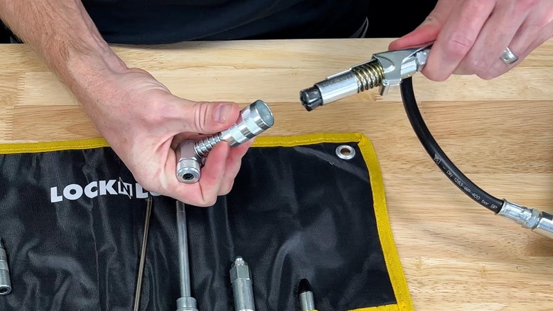 LockNLube 8-Piece Quick Connect Greasing Accessory Kit. Complete grease fitting connection kit. Reach any grease fitting on any machine. The rip-stop case keeps tools clean and portable. - Image 4