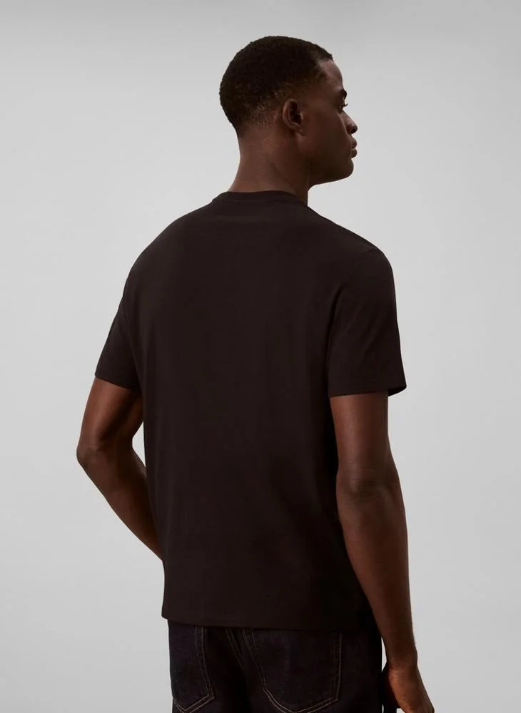 Calvin Klein Jeans  Script Logo Graphic T-Shirt for Men | Best Price UAE