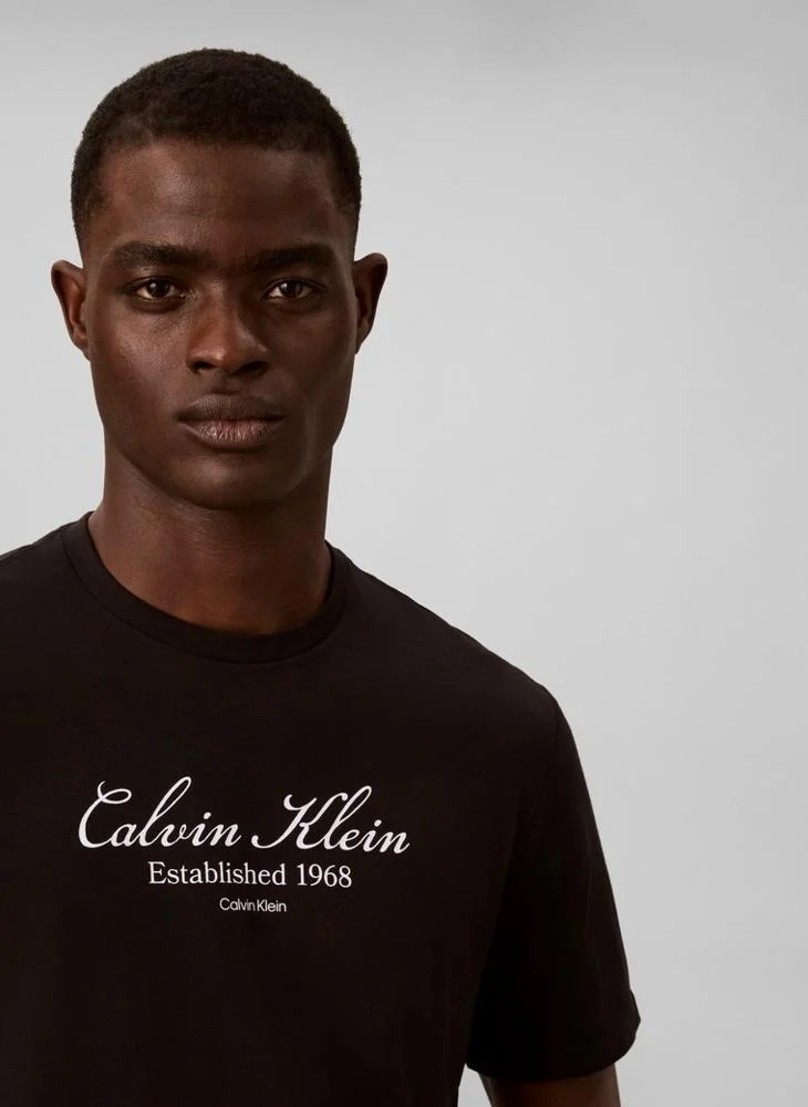 Calvin Klein Jeans  Script Logo Graphic T-Shirt for Men | Best Price UAE