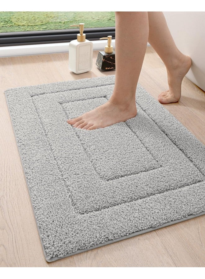 DEXI Bathroom Rug 32x20, Non Slip Washable Bath Mat for Shower Floor, Absorbent Soft Bathmat with Rubber Backing, Quick Dry Microfiber Carpet, Light Grey - Image 1