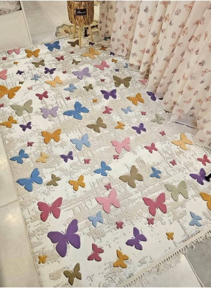 The butterfly rug and its beauty is a very cheerful rug. Its shape is the moon and its size is 150*220. It will be useful for you in the children’s rooms. It is a masterpiece, and also for the kitchen and also in the living room. Don’t forget its size is 150*220. Literally, the moon. Its floor is ghostly like this with the colors of the butterflies, making it look and haha.