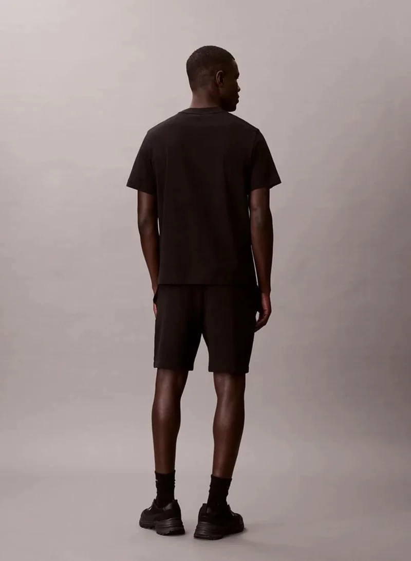 Calvin Klein Black Cotton Terry Badge Jogger Shorts for Men | Best Price UAE