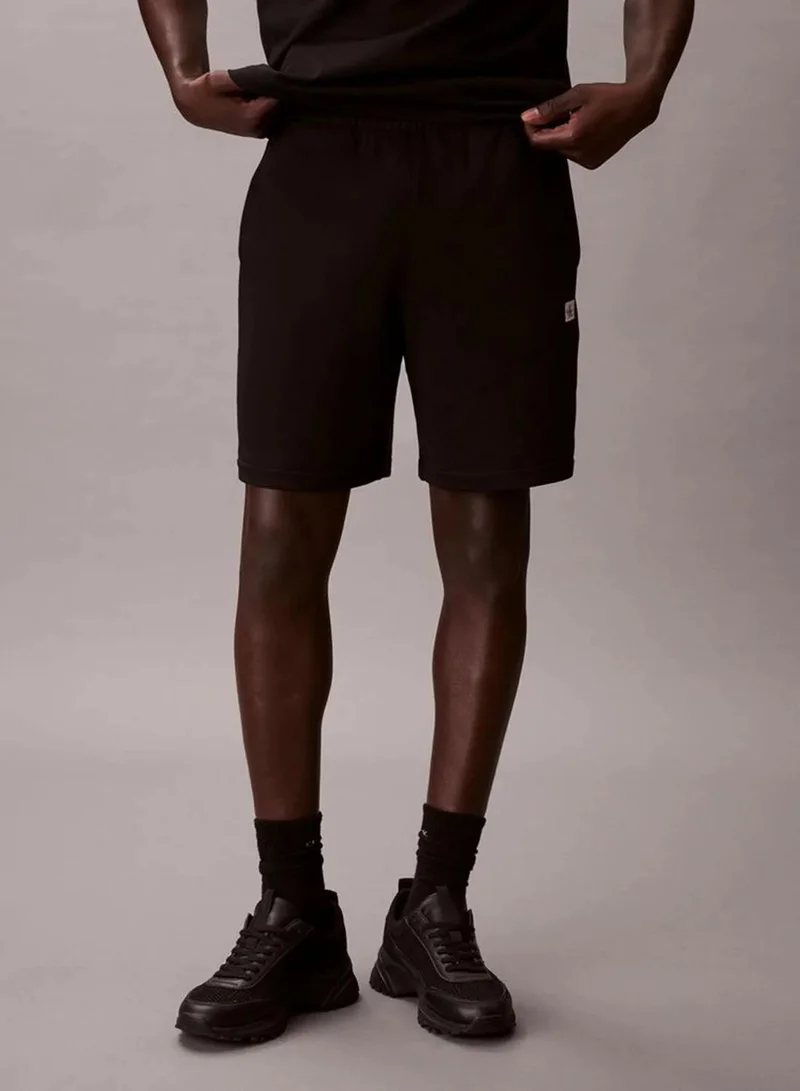 Calvin Klein Black Cotton Terry Badge Jogger Shorts for Men | Best Price UAE