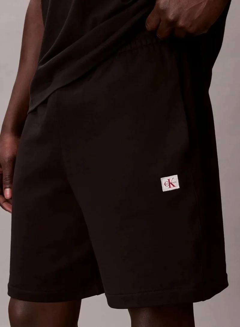 Calvin Klein Black Cotton Terry Badge Jogger Shorts for Men | Best Price UAE