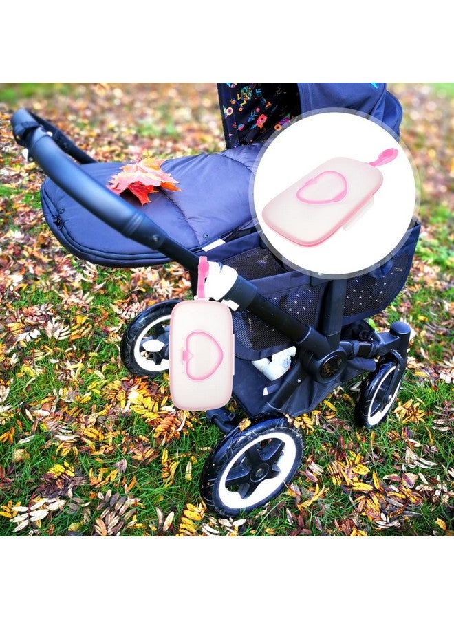 هيلفتي حامل مناديل مبللة للأطفال من هيليفتي، حقيبة محمولة قابلة لإعادة الاستخدام والتعبئة للسفر في الهواء الطلق، حقيبة حمل مناديل مبللة معلقة لعربة الأطفال باللون الوردي - Image 1