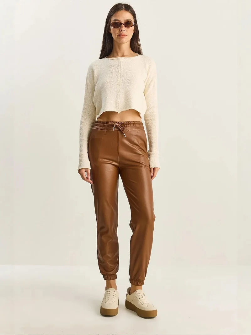 بيانكو لوتشي LUCCI Faux Leather Jogger Pants with Tie Closure