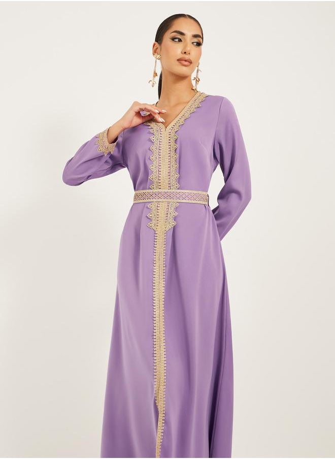 Arabic Kaftan with V neck and gold lace trims at neckline, sleeve hem and centre front along with fabric belt. Lace trim on fabric belt - pzsku/Z9E641EDA5EAE7EF53161Z/45/1741119744/b4969bd6-2b36-4929-80f3-70258d3eb3ce