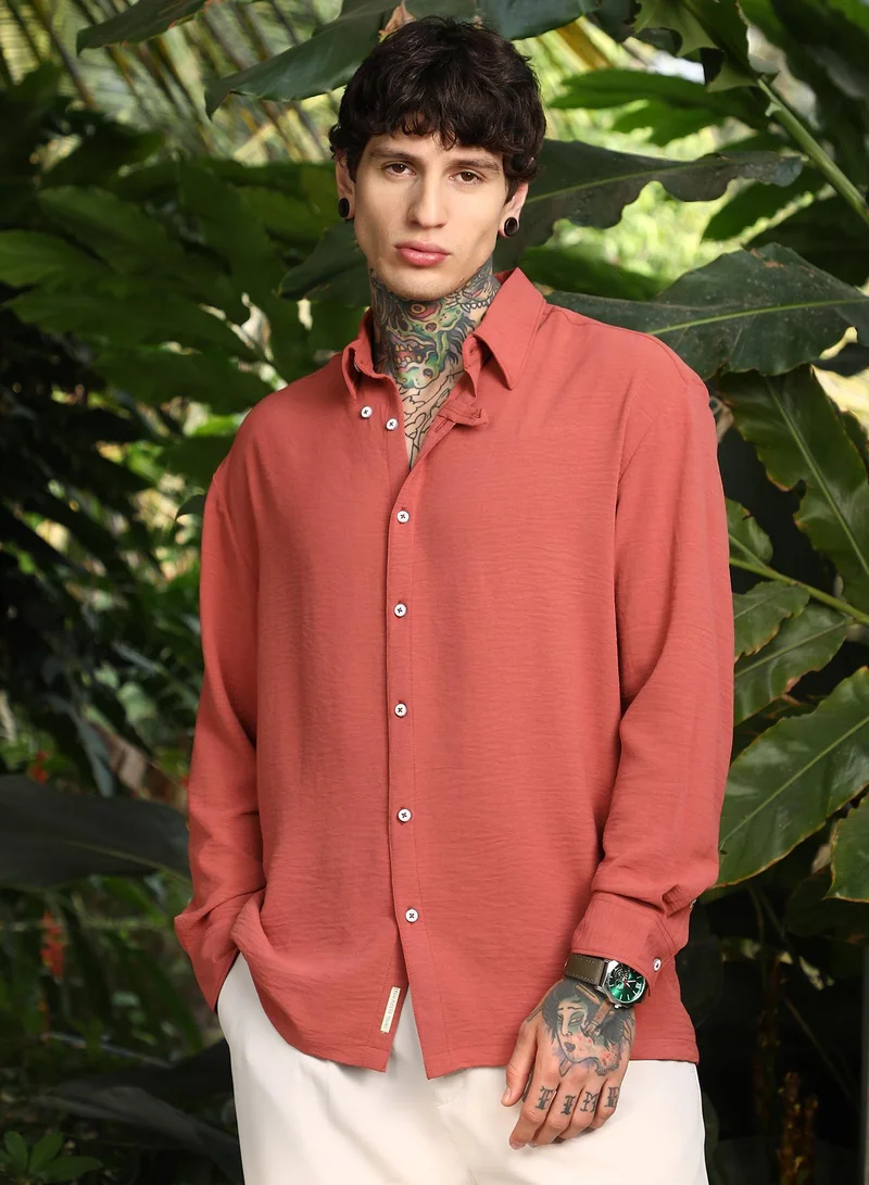 Campus Sutra Men's Coral Orange Breezy Wrinked Shirt For Casual Wear | Spread Collar | Long Cuffed Sleeves | Button Closure | Shirt Crafted With Comfort Fit For Everyday Wear