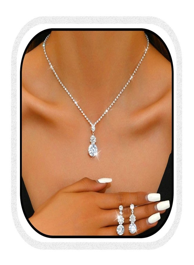 يونيكرا طقم مجوهرات زفاف مرصع بأحجار الراين من يونيكرا، يتضمن قلادة وأقراط فضية، مناسب للعرائس وحفلات التخرج الرسمية (فضي). - Image 1