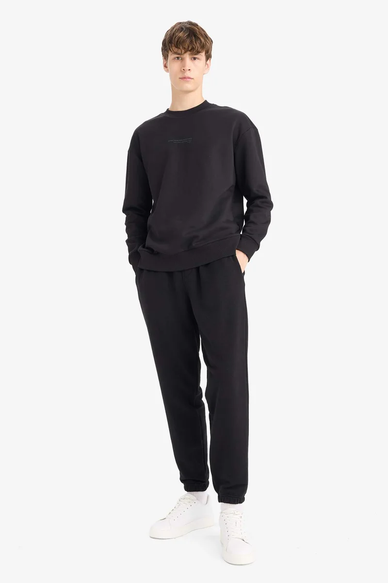 ديفاكتو Boxy Fit Printed Crew Neck Long Sleeve Sweatshirt