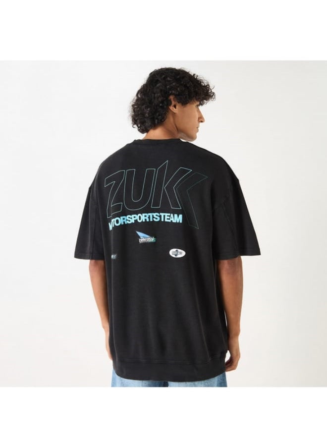 SP Characters Graphic Print Oversized T-shirt with Short Sleeves  - Image 3