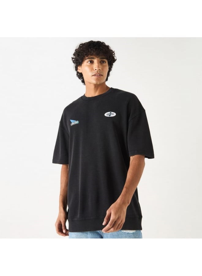 SP Characters Graphic Print Oversized T-shirt with Short Sleeves  - Image 1