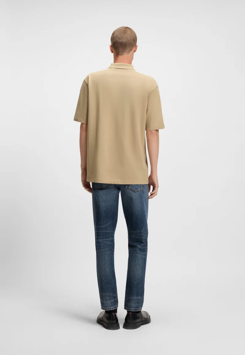 هوجو Relaxed-fit polo shirt in cotton with split logo