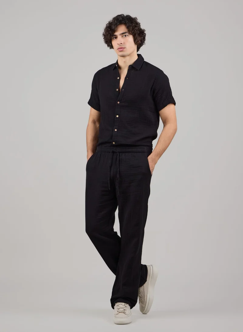 جاست نيتشر قميص تيم بقصّة مريحة