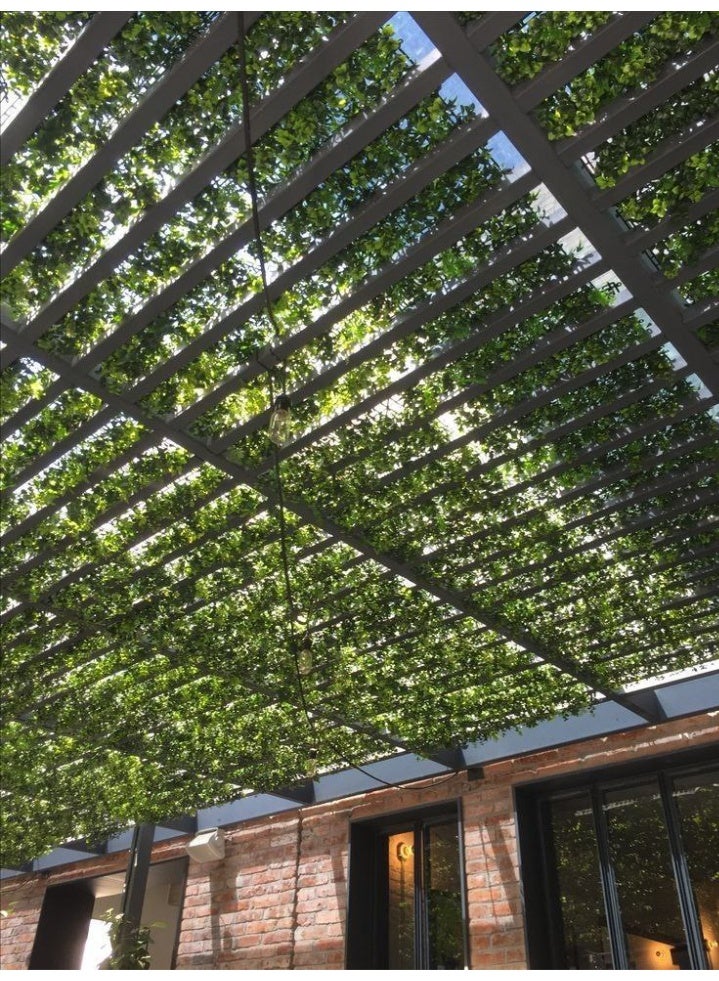 Leaf pergola 🌿 A wooden pergola with artificial flowers that can be hung from the house and balcony, on the fence, and on the wall, adding a touch of beauty. The product has a zipper, according to the size you prefer. It opens up to 2 meters and is 70 cm long. It is an imported product. Note: The product does not have lighting. - Image 2