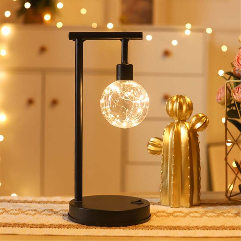 مصباح طاولة صغير من الحديد المطاوع 12.2 × 7.09 × 6.3 بوصة بتصميم مفرغ أسود مع توهج LED ناعم لديكور غرفة النوم والمدفأة والشرفة - Image 1