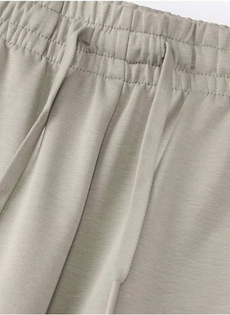 جيوردانو Men's Interlock Shorts - Khaki