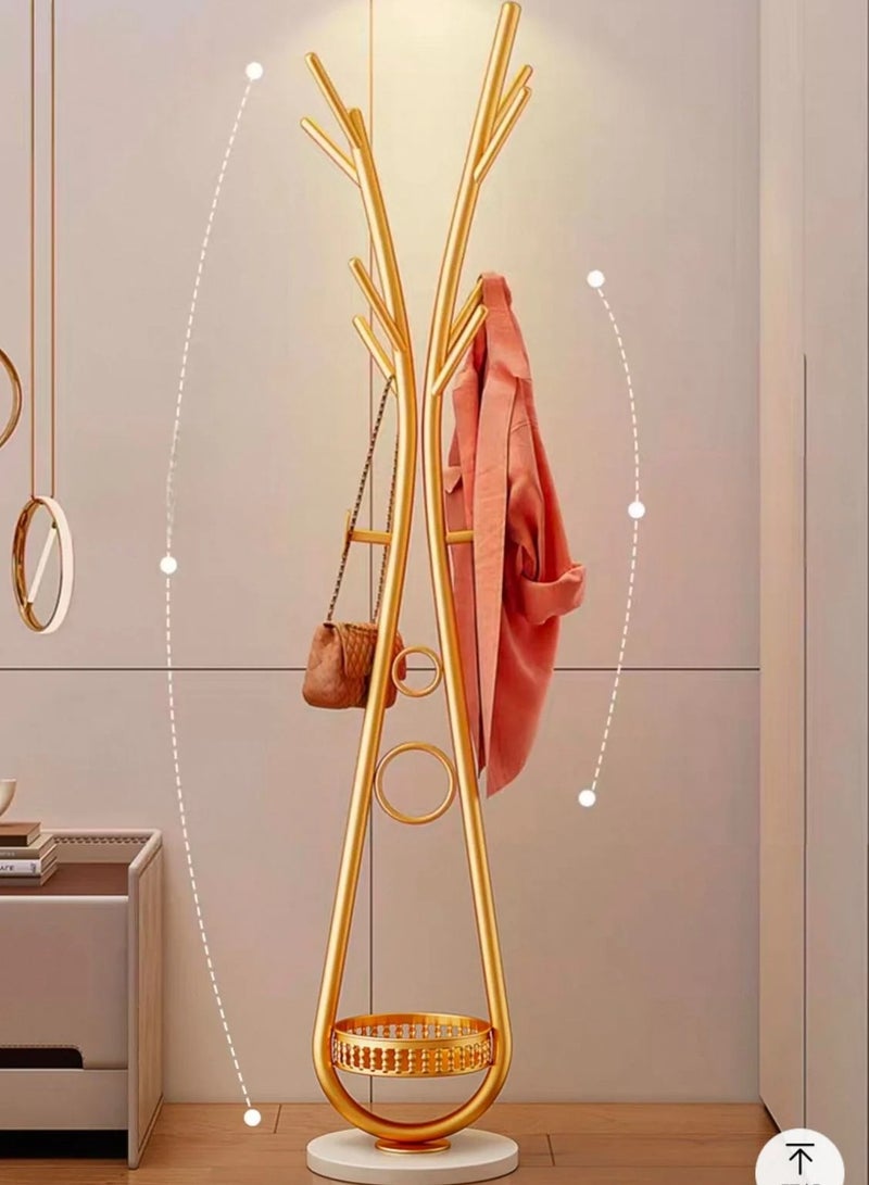 شي ون علاقة ملابس مودرن بتصميم نحتي فاخر من SHEE ONE | حامل معاطف معدني مقاوم للصدأ مع خطافات متعددة | قاعدة دائرية ثابتة وتخزين سفلي ذكي | مناسب للمداخل والغرف الصغيرة | متوفر بعدة ألوان أنيقة | 172×30×30 سم | لون ذهبي - Image 1