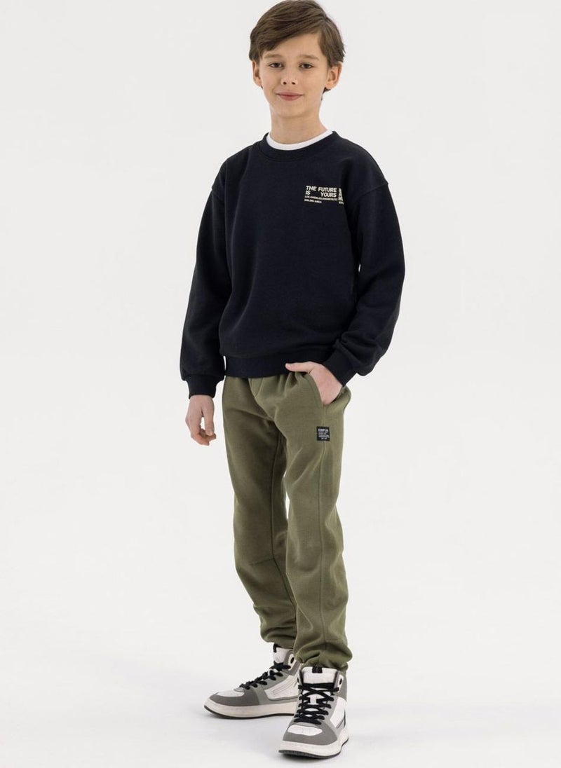 MINOTI Kids Jogger Trousers With Patch Detail - Image 1