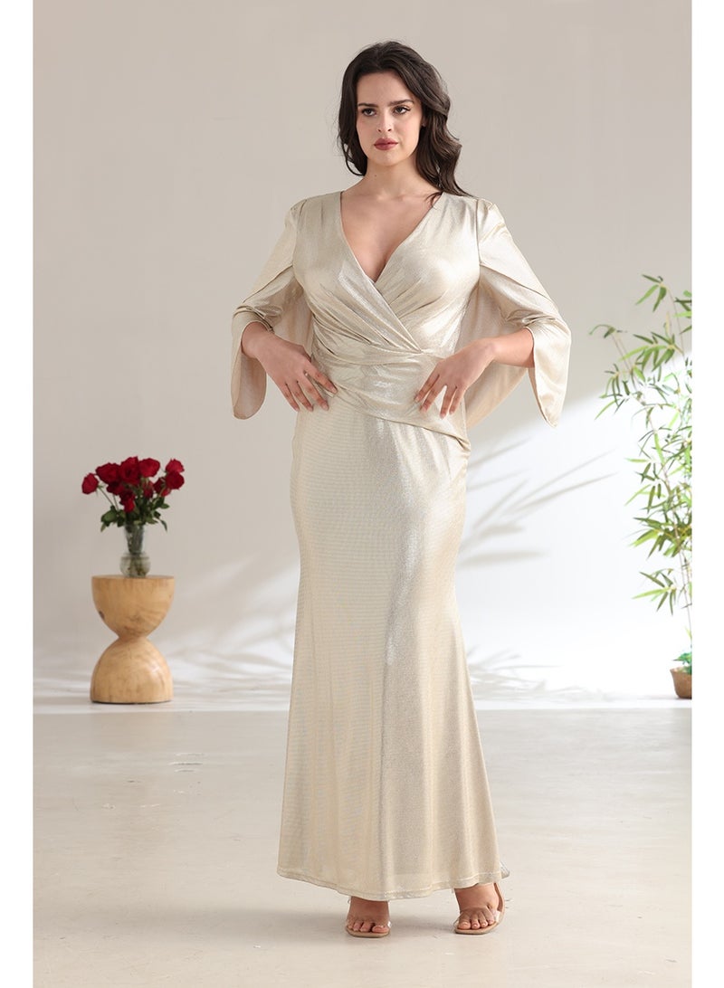A long champagne-colored evening dress with a wrap silhouette and elegant wide sleeves. - Image 1