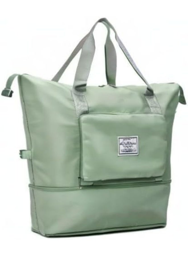 A multi-purpose bag that folds easily, features a front pocket and a top zipper, and can be attached to the handle of a suitcase. It's specially designed to combine style, comfort, and practicality. Green - Image 1
