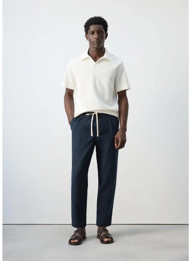 Mango Man  Regular-fit textured polo shirt for Men | Best Price UAE