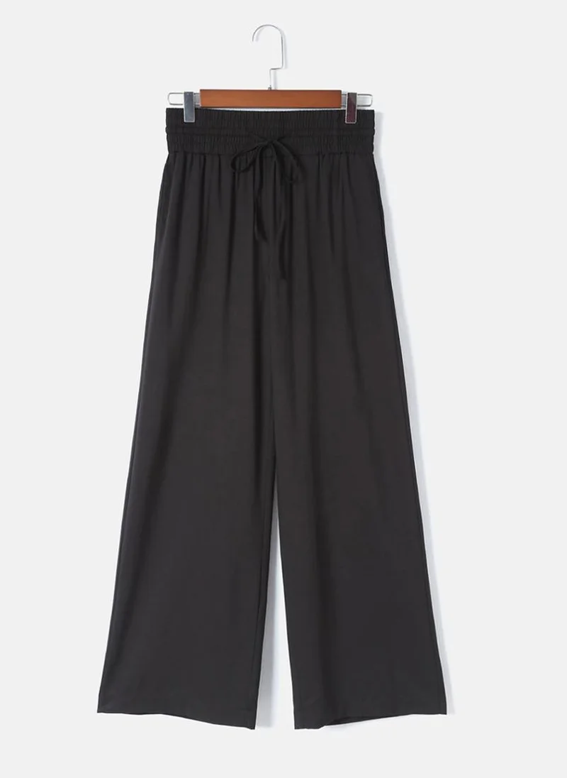 يونيكي Black Plain Casual Trouser